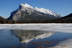 
Mount Rundle Is Reflected In Frozen Vermillion Lake In Late Afternoon In Winter
